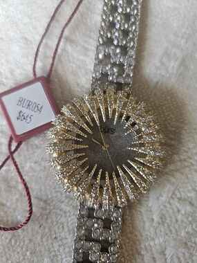 Class Act, Snazzy Women's Gold and Silver Crystal Sunburst Watch. Burgi Brand